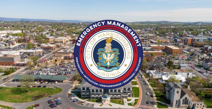 Emergency Management logo over an aerial picture of Downtown Harrisonburg